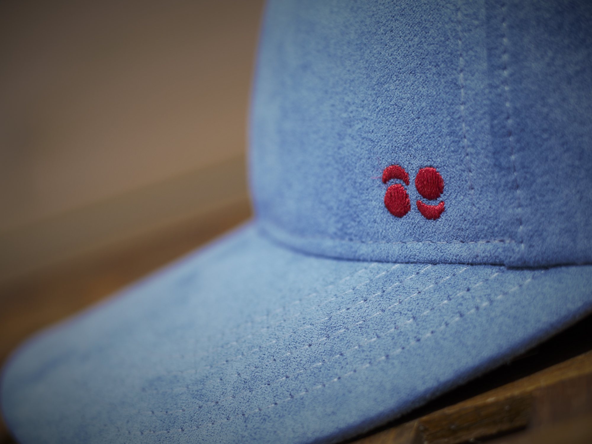 Precision embroidery on a custom baseball cap